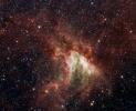 NASA's Spitzer Space Telescope has captured a new, infrared view of the choppy star-making cloud called M17, or the Swan nebula.