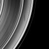 The short and slender shadow of Pan is cast over Saturn's A ring as the moon orbits within the Encke Gap in this from NASA's Cassini spacecraft taken on April 10, 2009.