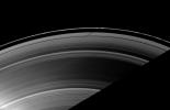 The shadow of the moon Mimas strikes the F ring at a different angle than the angle at which it is cast on the A ring, illustrating differences in the vertical heights of the rings in this image as seen by NASA's Cassini spacecraft.