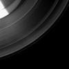NASA's Cassini spacecraft shows a section of Saturn and its rings which includes a special treat made possible as the planet approaches its August 2009 equinox: the shadow of a moon cast on the rings.