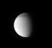 This ultraviolet view of Titan shows the moon's north polar hood and its detached, high-altitude haze layer. This image was taken with NASA's Cassini spacecraft's narrow-angle camera on Aug. 13, 2009.