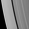 The small moon Pan casts a short shadow on Saturn's A ring in this image taken by NASA's Cassini spacecraft as the planet approached its August 2009 equinox.