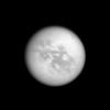 In the top right of NASA's Cassini image, the southern end of Titan's huge lake of liquid hydrocarbons called Kraken Mare is visible near the moon's north pole.