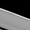 Vertical structures created by Saturn's small moon Daphnis cast long shadows across the rings in this dramatic image taken by NASA's Cassini spacecraft on June 8, 2009, as the planet approaches its mid-August 2009 equinox.