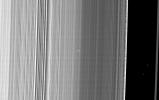 NASA's Cassini spacecraft captured this image of a small object in the outer portion of Saturn's B ring casting a shadow on the rings as Saturn approaches its August 2009 equinox.