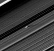 An unusually large propeller feature is detected just beyond the Encke Gap in this image from NASA's Cassini spacecraft of Saturn's outer A ring taken a couple days after the planet's August 2009 equinox.