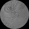 The northern and southern hemispheres of Saturn's moon Tethys are seen in these polar stereographic maps, mosaicked from the best-available images from NASA's Cassini spacecraft.