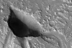 NASA's Mars Reconnaissance Orbiter captured this image of Hebrus Valles, located in the plains of the Northern lowlands, just west of the Elysium volcanic region.