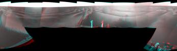 This stereo mosaic of images from NASA's Mars Exploration Rover Opportunity shows surroundings of the rover's location following an 111 meters (364 feet) drive east-northeastward on Feb. 12, 2009. 3D glasses are necessary to view this image.