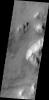 Faint dust devil tracks can be seen in this image from 2001 Mars Odyssey spacecraft. These tracks are located on the eastern margin of Argyre Planitia on Mars.