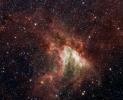NASA's Spitzer Space Telescope has captured a new, infrared view of the choppy star-making cloud called M17, also known as Omega Nebula or the Swan nebula.
