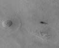 The Context Camera aboard NASA's Mars Reconnaissance Orbiter discovers new dark spots on Mars that, upon closer examination, turn out to be brand new impact craters.