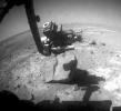 NASA's Mars Exploration Rover Opportunity used the wire brush of its rock abrasion tool to scour dust from a circular target area on a rock called 'Marquette Island.'