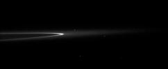 In this image taken by NASA's Cassini spacecraft, the bright arc in Saturn's faint G ring contains a little something special. Although it can't be seen here, the tiny moonlet Aegaeon orbits within the bright arc.