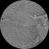 The northern hemisphere of Saturn's moon Dione is seen in this polar stereographic maps, mosaicked from the best-available clear-filter images from NASA's Cassini and Voyager missions.