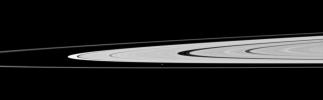 Saturn's moon Atlas, just below the center of this image taken by NASA's Cassini spacecraft, orbits in the Roche Division between the A ring and thin F ring.