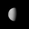 Saturn's moon Dione dwarfs the moon Telesto in this image captured by NASA's Cassini spacecraft image. Dione is the fourth largest of Saturn's moons, and it dominates this view. Tiny Telesto can be seen below and to the left of Dione.