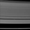Saturn's small moon Pan casts a long shadow across the A ring in this image captured by NASA's Cassini spacecraft a few days after the planet's August 2009 equinox.