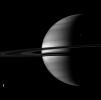 Four of Saturn's moons join the planet for a well balanced portrait. Titan, Saturn's largest moon, is in the lower left. Tethys appears in upper right. The smaller moons Pandora and Epimetheus are barely visible here.