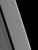 Clumps of ring material are revealed along the edge of Saturn's A ring in this image taken during the planet's August 2009 equinox. The granular appearance of the outer edge of the A ring is likely created by gravitational clumping of particles there.
