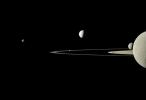 This image from NASA's Cassini spacecraft captured five of Saturn's moons. Moons visible in this view: Janus; Pandora; Enceladus, Mimas & Saturn's second largest moon, Rhea.
