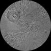The northern hemisphere of Saturn's moon Tethys is seen in this updated polar stereographic map, mosaicked from the best-available images obtained by NASA's Cassini spacecraft.