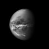 NASA's Cassini spacecraft chronicles the change of seasons as it captures clouds concentrated near the equator of Saturn's largest moon, Titan. Methane clouds in the troposphere, the lowest part of the atmosphere, appear white here.