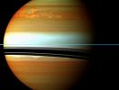 This false-color mosaic from NASA's Cassini spacecraft shows the tail of Saturn's huge northern storm. The head of the storm is beyond the horizon in this view.