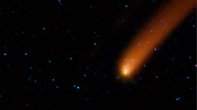 Is it a bird, or a plane? No, it's comet Siding Spring streaking across the sky, as seen by NASA's Wide-field Infrared Survey Explorer, or WISE. An animation is available at the Photojournal.