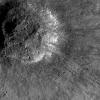 This is a view from NASA's Lunar Reconnaissance Orbiter of a very young impact crater in Balmer basin. The dark streamers are impact melt splashes thrown out during the crater formation.