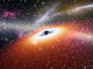 This artist's conception illustrates one of the most primitive supermassive black holes known (central black dot) at the core of a young, star-rich galaxy.