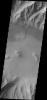 This image taken by NASA's 2001 Mars Odyssey of the eastern end of Coprates Chasma contains a landslide deposit and sand dunes. Both features are typical for the chasmata that make up Valles Marineris.