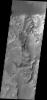 This image of Terra Cimmeria taken by NASA's 2001 Mars Odyssey shows channeling and dunes near Herschel Crater.