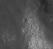 NASA's Lunar Reconnaissance Orbiter's view of boulders on an outlying rampart of the complex central peak of Tsiolkovskiy crater.