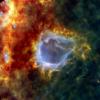 The large bubble is an embryonic star that looks set to turn into one of the brightest stars in our Milky Way galaxy in this infrared image from the Herschel Space Telescope.