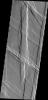 NASA's Mars Odyssey captured this image of Ulysses Fossae, located in the Tharsis Volcanic region. Cross cutting tectonic fractures indicate that this region underwent stresses in multiple directions.