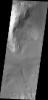 Layering is visible in these deposits on the floor of Juventae Chasma in this image captured by NASA's 2001 Mars Odyssey.