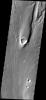 This streamlined island is located within Maja Valles was captured by NASA's Mars Odyssey on July 1, 2010.