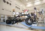 The suspension system on NASA Mars rover Curiosity easily accommodates rolling over a ramp in this Sept. 10, 2010, test drive inside the Spacecraft Assembly Facility at NASA's Jet Propulsion Laboratory, Pasadena, Calif.
