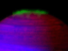 This frame from a movie, made from data obtained by NASA's Cassini spacecraft, shows Saturn's southern aurora shimmering over approximately 20 hours as the planet rotates. The video is available at the Photojournal.