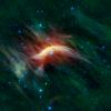 The blue star near the center of this image is Zeta Ophiuchi. Zeta Ophiuchi is actually a very massive, hot, bright blue star plowing its way through a large cloud of interstellar dust and gas in this image from NASA's Wide-field Infrared Survey Explorer.