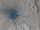 This image from NASA's Mars Reconnaissance Orbiter shows an approximately 7-meter diameter fresh crater and dark ejecta blanket. These small impact craters continue to form on Mars, and are most easily recognized in areas covered by bright dust.