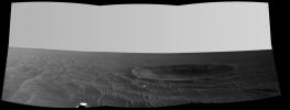 This mosaic is a view from NASA's Mars Exploration Rover Opportunity of 'Yankee Clipper' crater which carries the name of the command and service module of NASA's 1969 Apollo 12 mission to the moon.