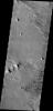 This image from NASA's Mars Odyssey is located west of Zephyria Planum. Surfaces in this region have undergone extensive erosion by the wind. Wind is one of the most active processes of erosion on the surface of Mars today.