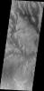 The channels in this image from NASA's 2001 Mars Odyssey spacecraft are draining a highstanding region north of Hellas Planum.