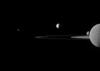 A quintet of Saturn's moons come together in this portrait from NASA's Cassini spacecraft. Janus is seen on the far left, Pandora orbits near the middle, Enceladus appears above the center, and Rhea and Mimas are seen on the right side.
