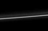 NASA's Cassini spacecraft captures Saturn's ever-changing F ring, showing its bright core, another strand of ring material, and a breakaway clump of material close to the core.