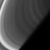 In this image, NASA's Cassini spacecraft has captured some of the structure of the tenuous D ring, appearing here as light/dark banding in the upper-right of the image.
