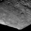 This image from NASA's Dawn spacecraft is of the south pole region of the asteroid Vesta, a mountain is rising approximately 9 miles (15 kilometers) above the floor of a crater.