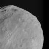 This image from NASA's Dawn spacecraft shows dark colored mountains (top of the image) in the northern region of asteroid Vesta. The origin of such mountains is currently being investigated.